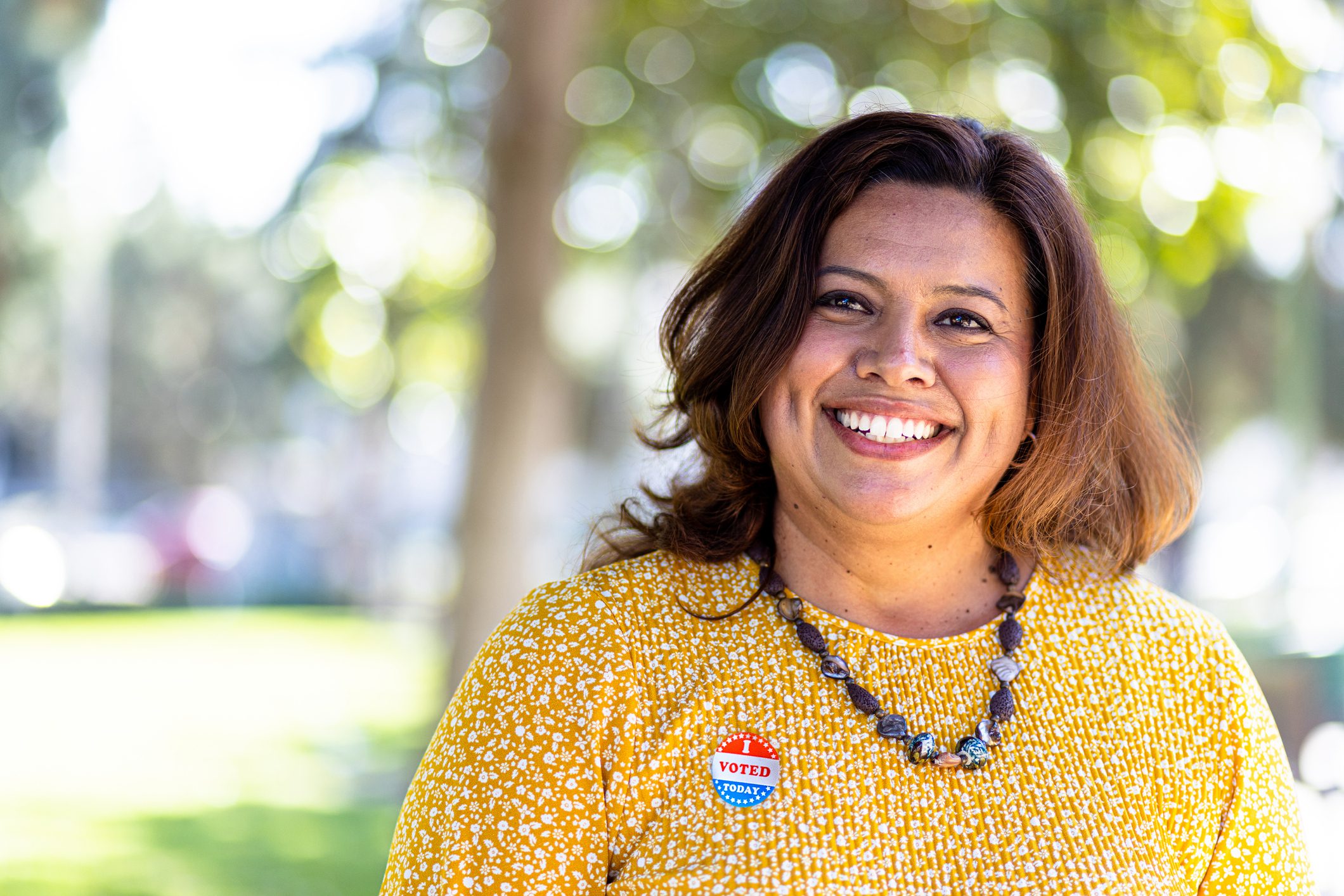 Teacher with I Voted sticker