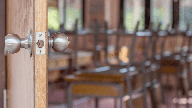 Picture of an open classroom door to illustrate the shut the door and teach principle